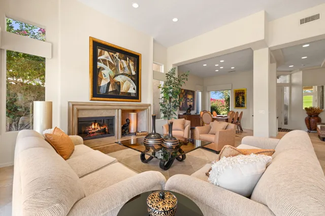 a kitchen with a sink and a large window