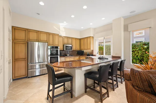 a view of a hallway with stairs