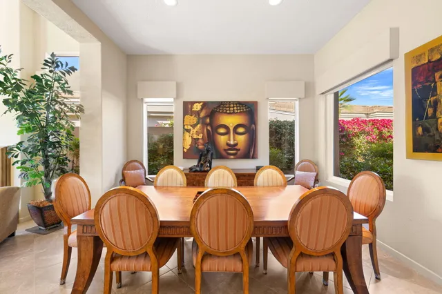 a bed sitting in a room next to a window