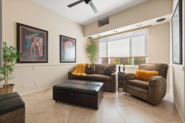 a view of a dinning table and chairs in patio