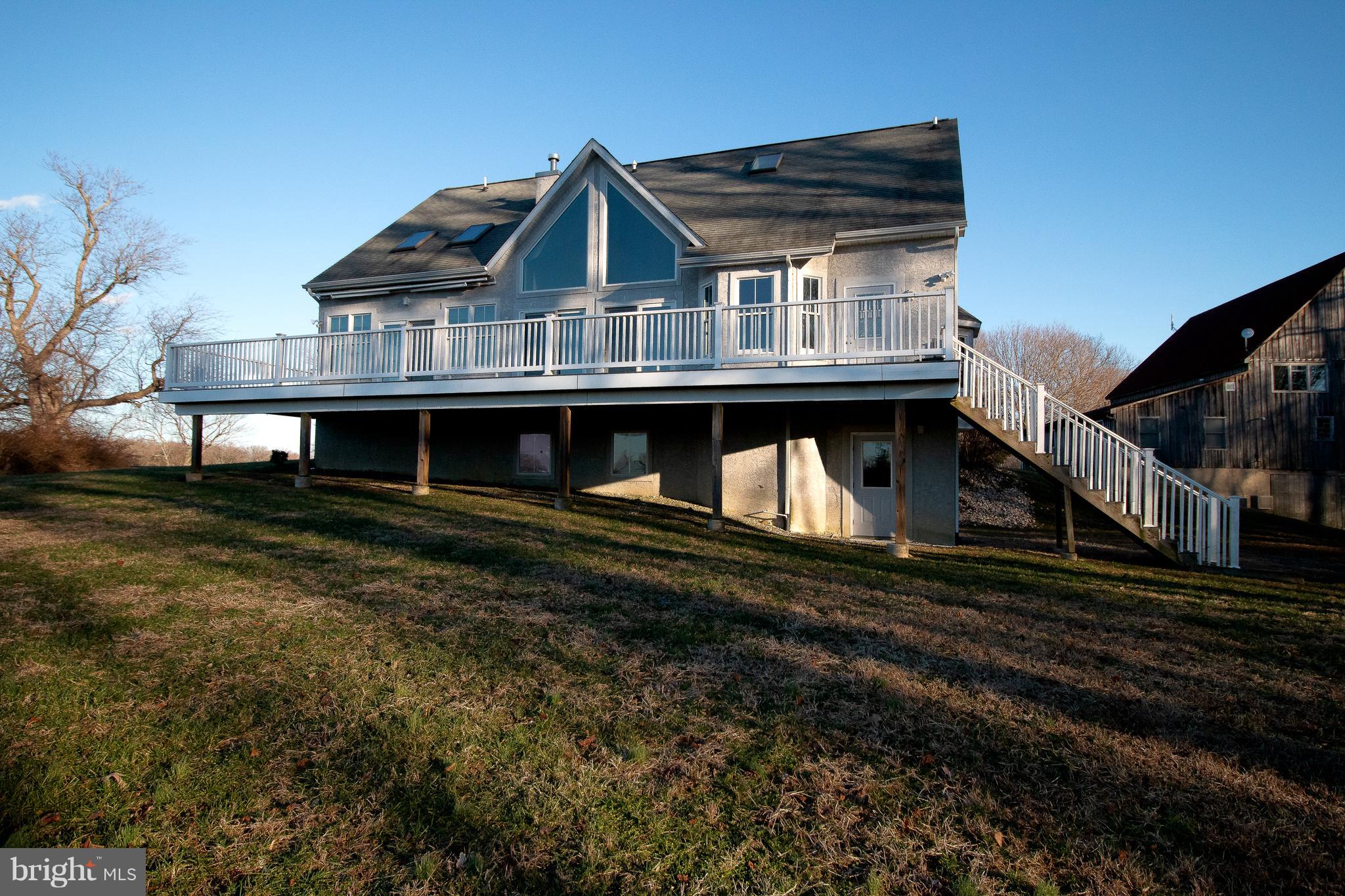 335 Stoney Battery Road Earleville, MD 21919 - Photo 3 of 46 Large deck on rear with beautiful views of river