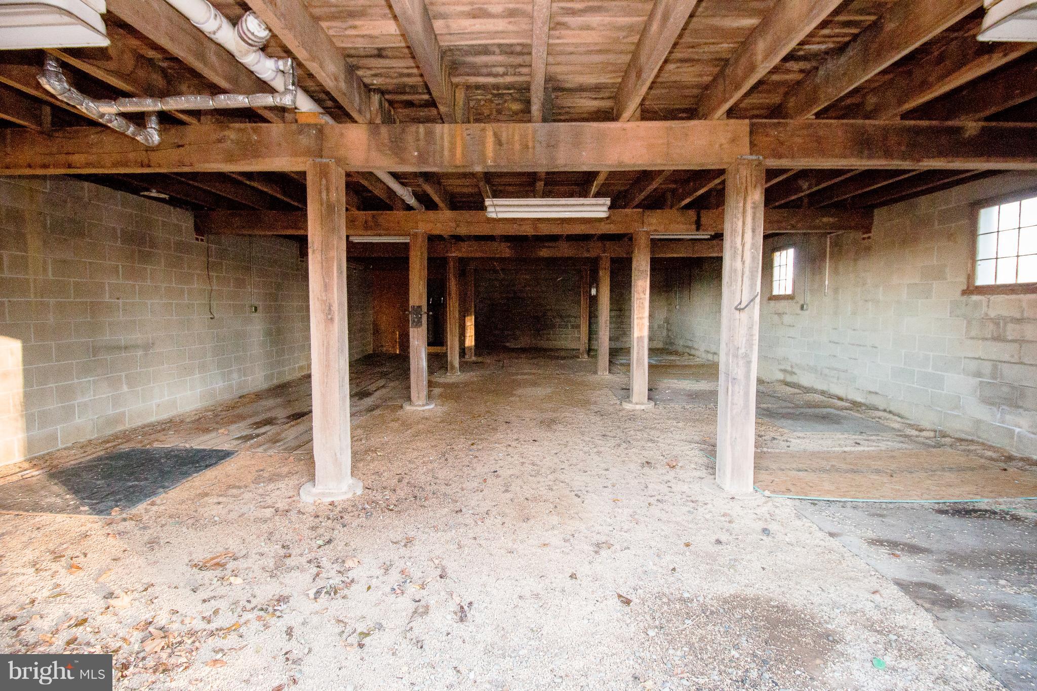 335 Stoney Battery Road Earleville, MD 21919 - Photo 46 of 46 Under Barn multi vehicle garage/storage area