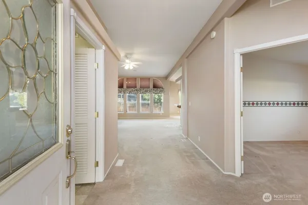 a view of entryway with wooden floor