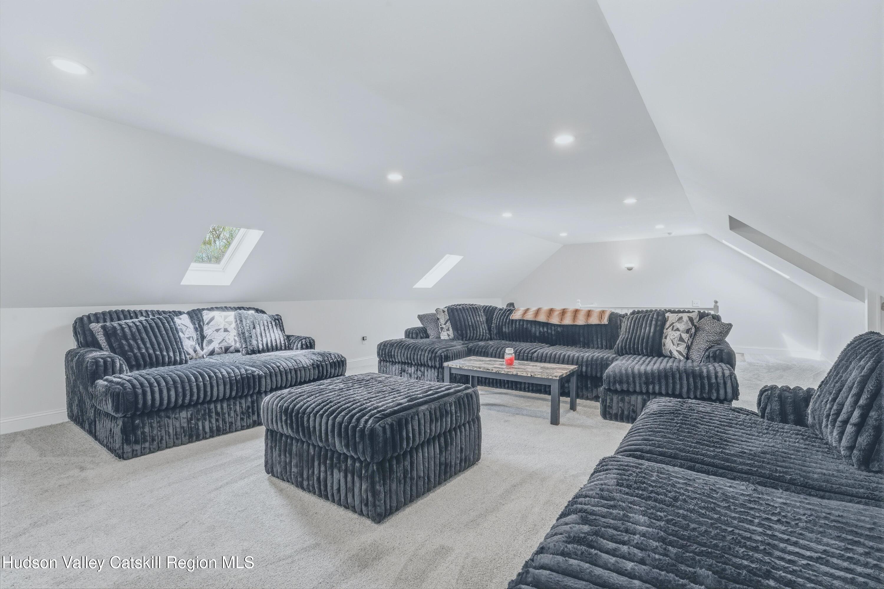 757 Taborton Road Sand Lake, NY 12153 - Photo 19 of 32 a living room with couches and a kitchen view
