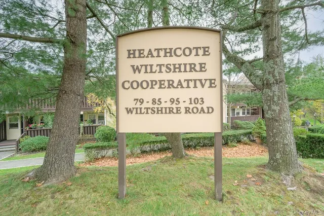 a sign on the side of the road