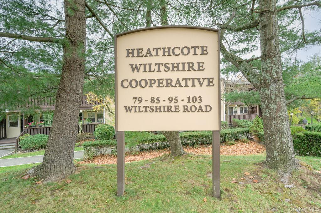103 Wiltshire Road, Unit D6 Scarsdale, NY 10583 - Photo 18 of 20 a sign on the side of the road