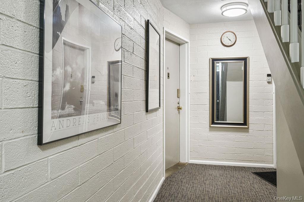 103 Wiltshire Road, Unit D6 Scarsdale, NY 10583 - Photo 2 of 20 a view of front door of a house