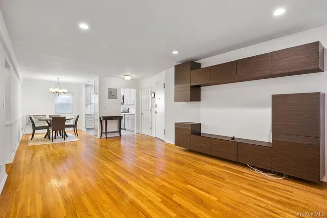 a view of a kitchen with dining table and chairs