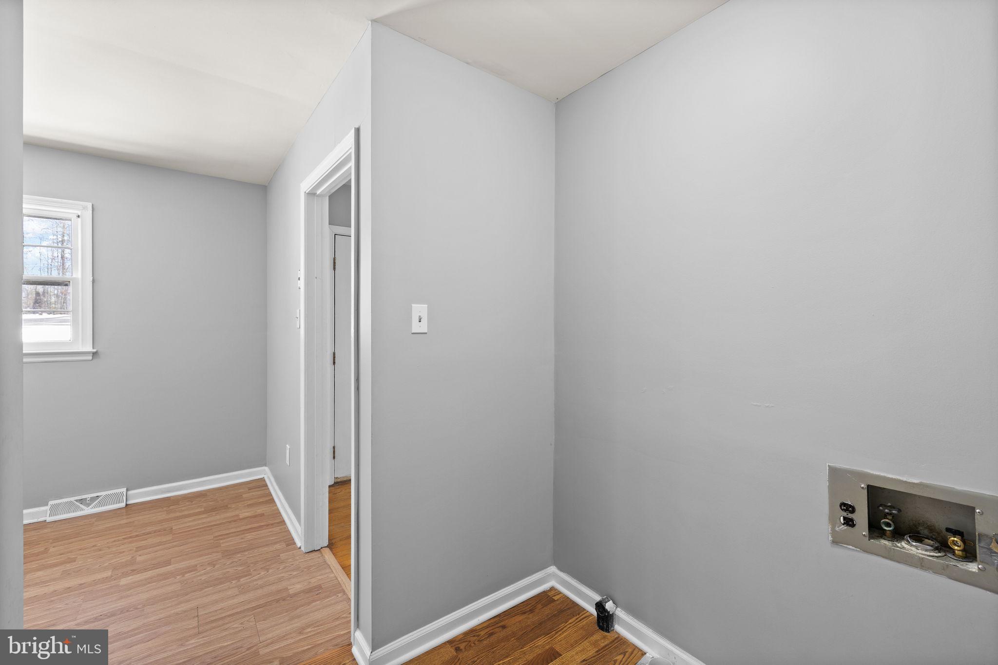 727 Chalklevel Road Louisa, VA 23093 - Photo 13 of 49 a view of a room with wooden floor and air conditioner