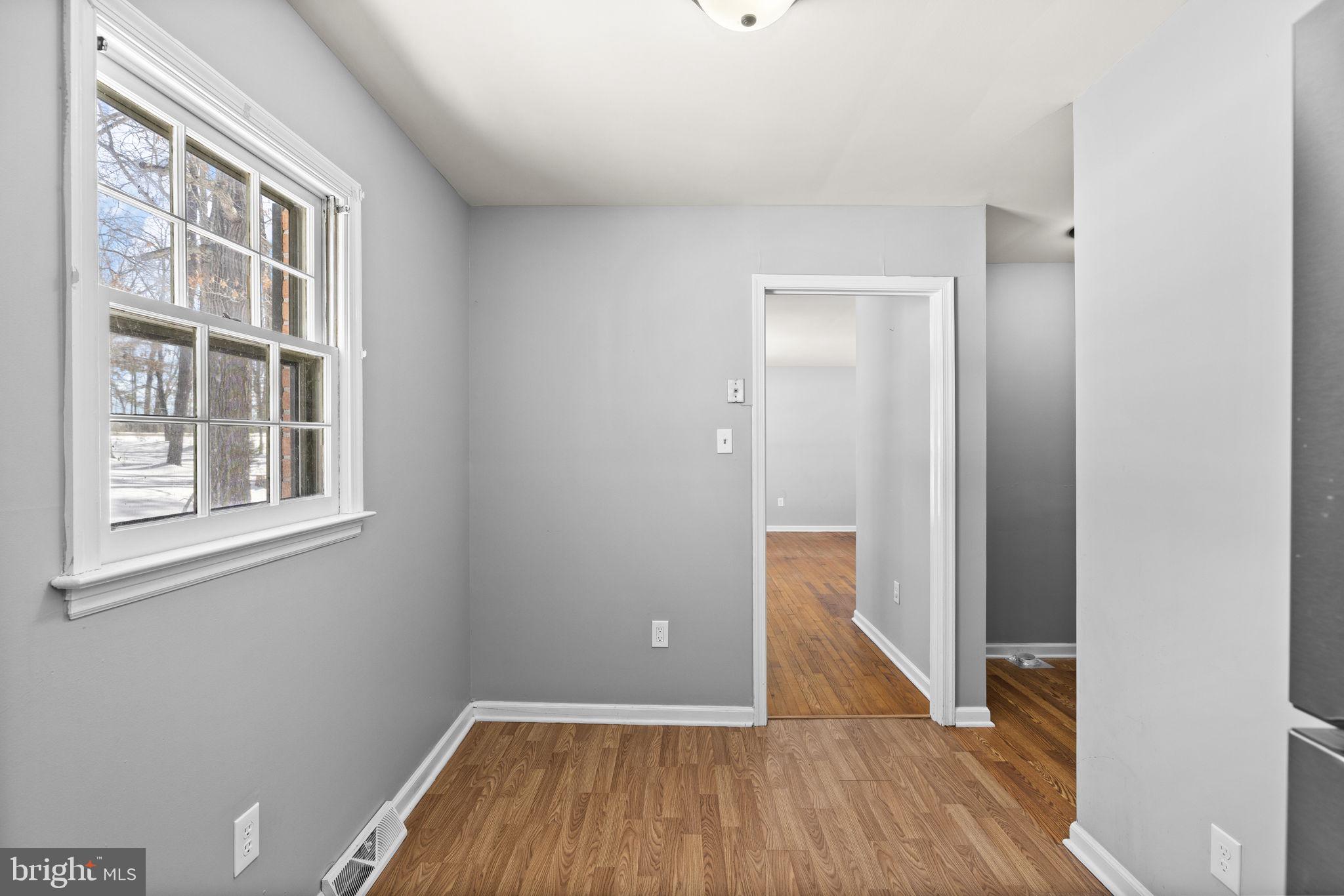 727 Chalklevel Road Louisa, VA 23093 - Photo 20 of 49 a view of a room with wooden floor and a window