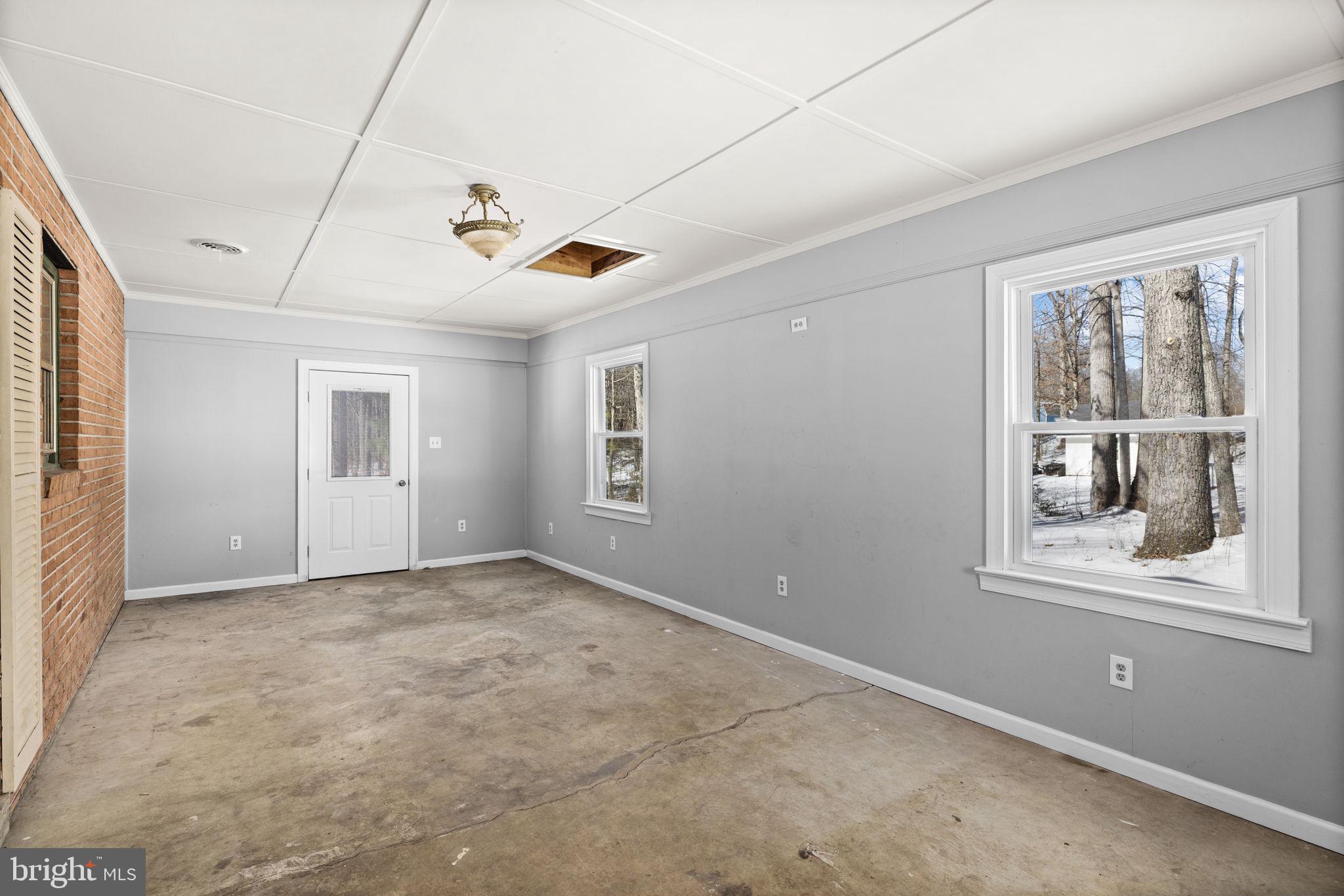 727 Chalklevel Road Louisa, VA 23093 - Photo 24 of 49 a view of an empty room with a window