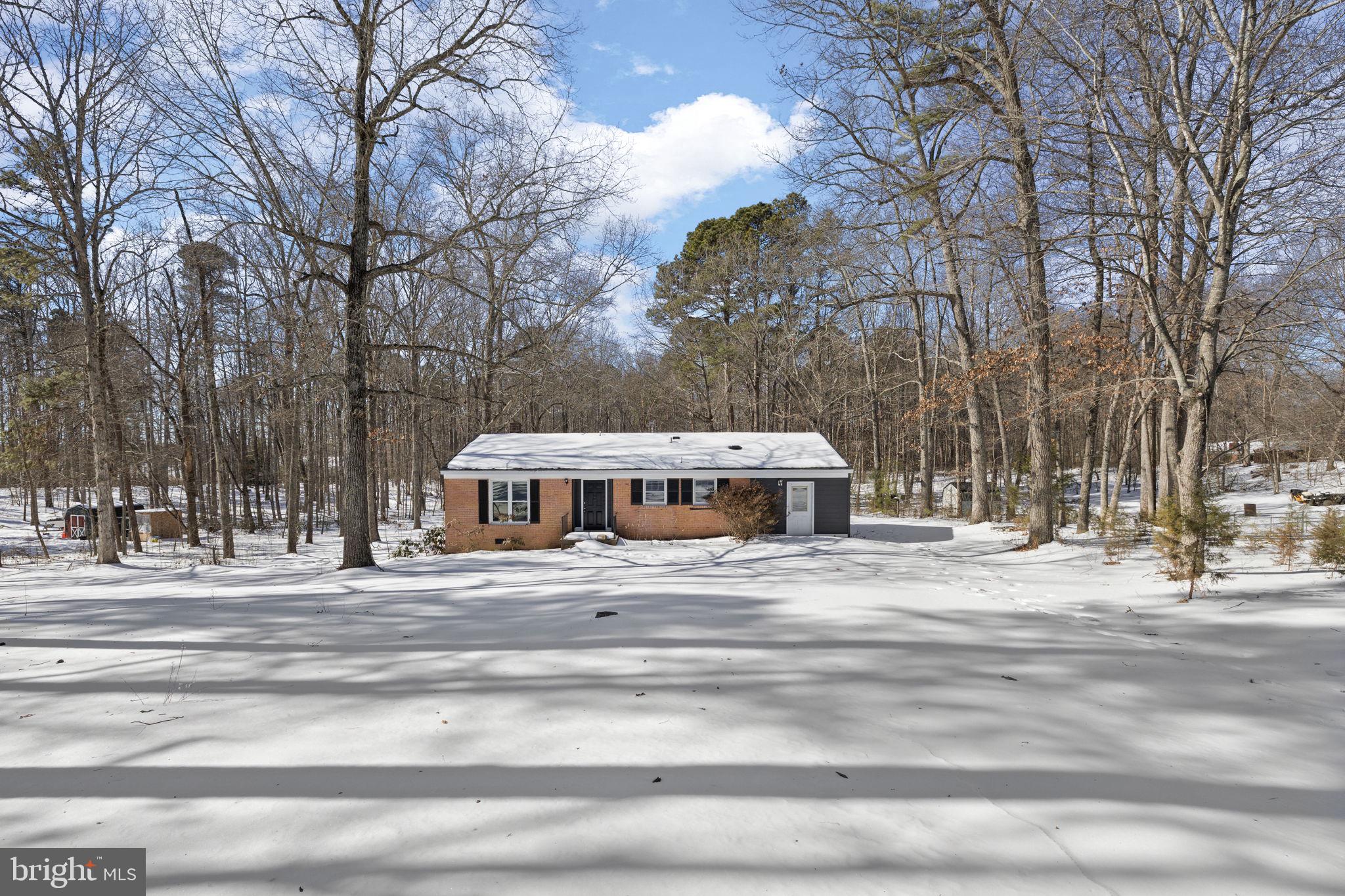 727 Chalklevel Road Louisa, VA 23093 - Photo 42 of 49 a house with trees in front of it