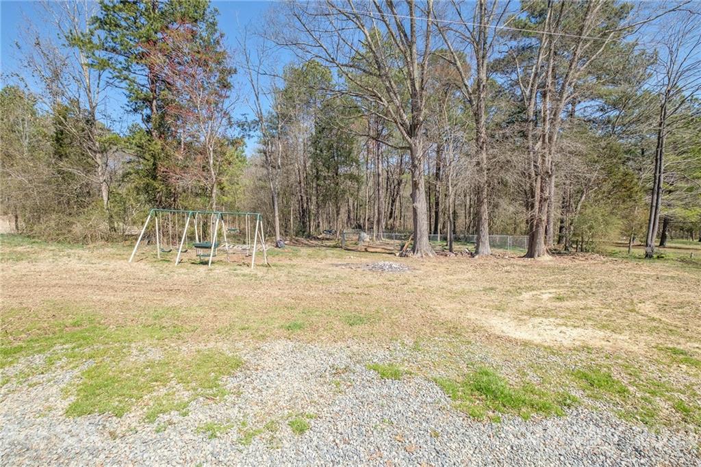3233 Drake Road Midland, NC 28107 - Photo 22 of 28 a view of outdoor space with trees