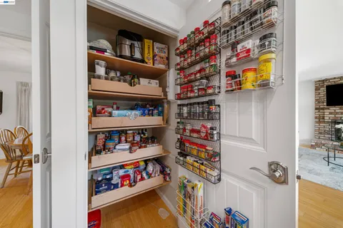 a living room with furniture a rug and a fireplace