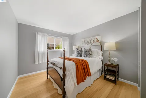 a view of a house with swimming pool and porch with furniture