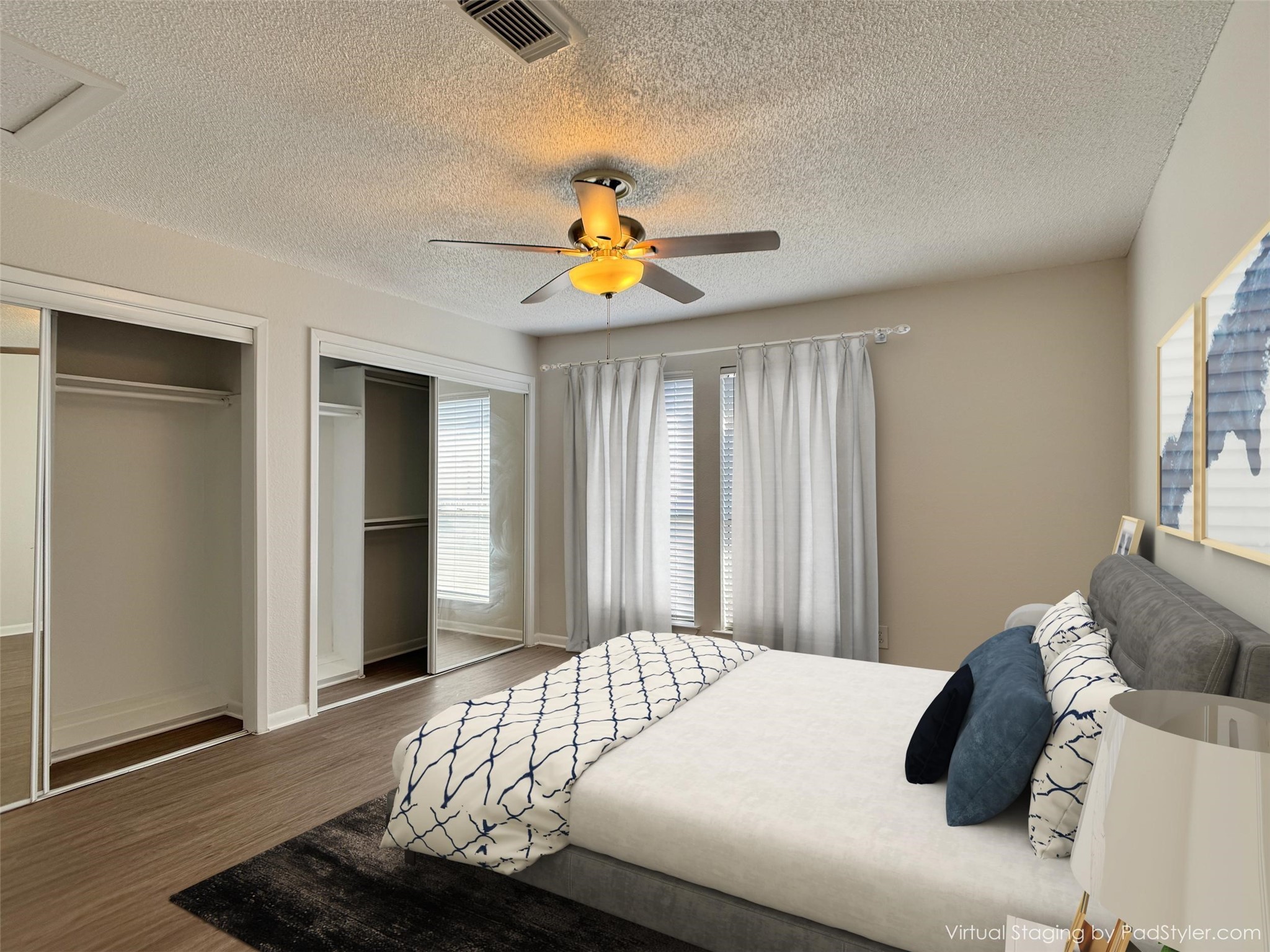 2277 South Kirkwood Road, Unit 404 Houston, TX 77077 - Photo 25 of 39 a bedroom with a bed and a chandelier