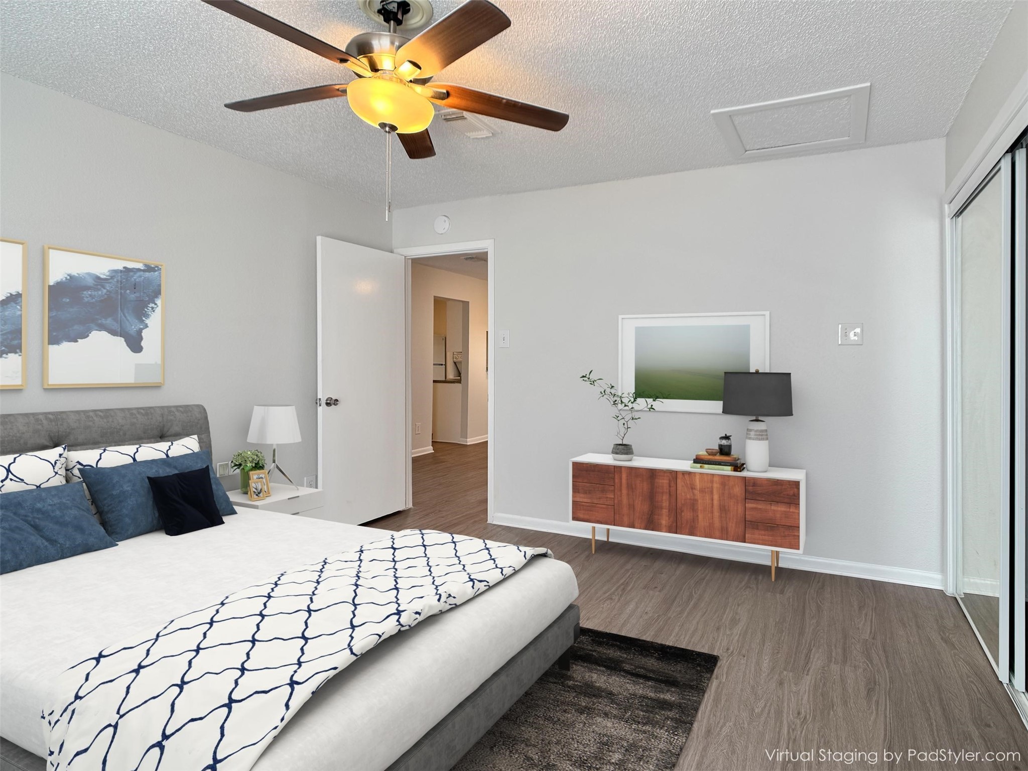 2277 South Kirkwood Road, Unit 404 Houston, TX 77077 - Photo 27 of 39 a bedroom with a bed and a chandelier