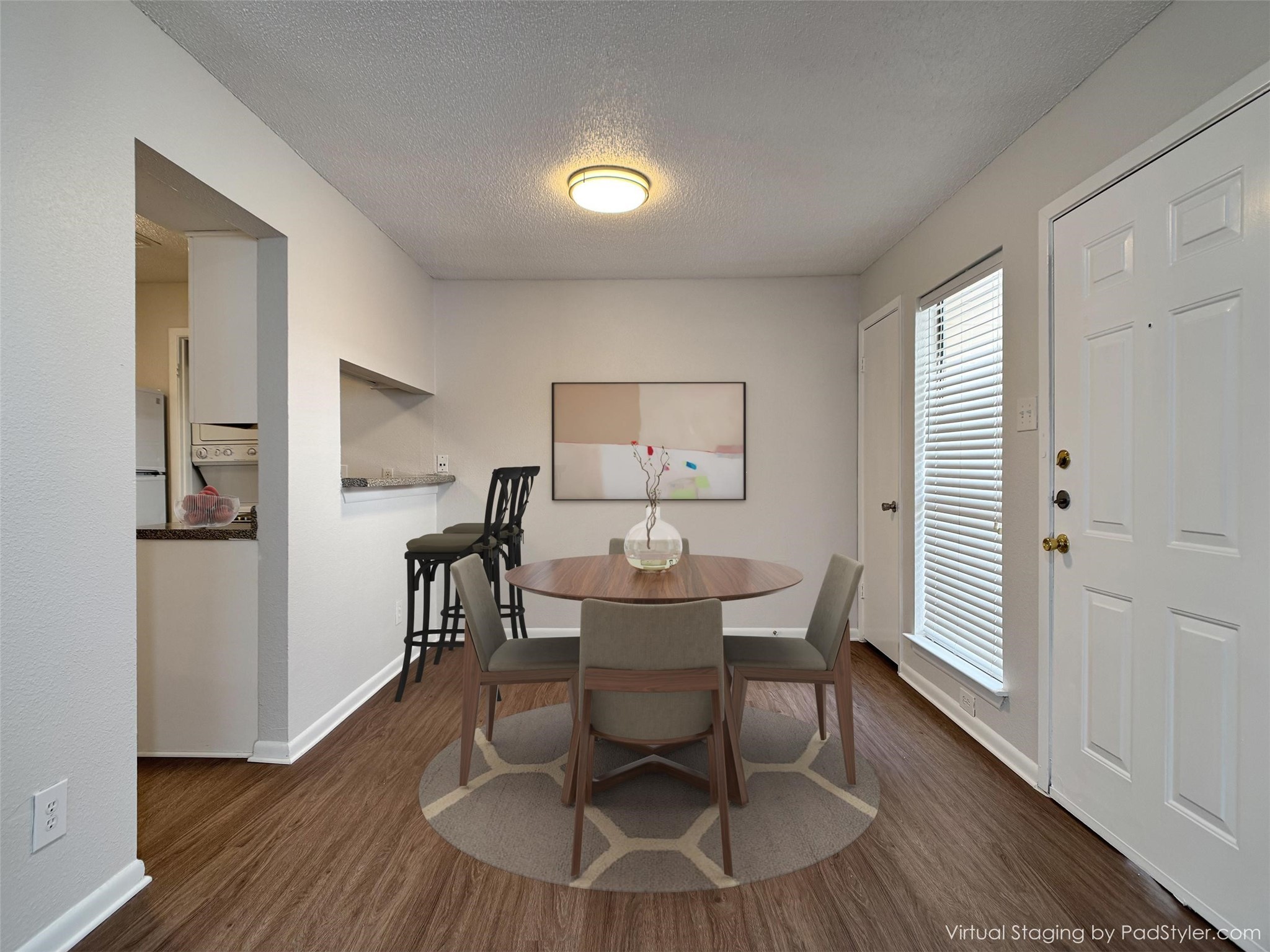 2277 South Kirkwood Road, Unit 404 Houston, TX 77077 - Photo 8 of 39 a view of a dining room with furniture window and wooden floor