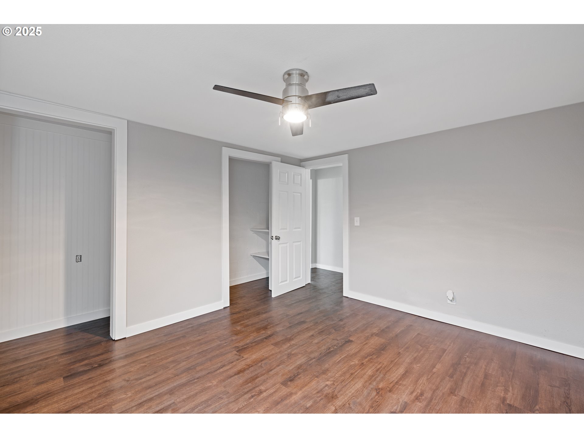 3317 Olive Way Longview, WA 98632 - Photo 13 of 29 a view of an empty room with wooden floor