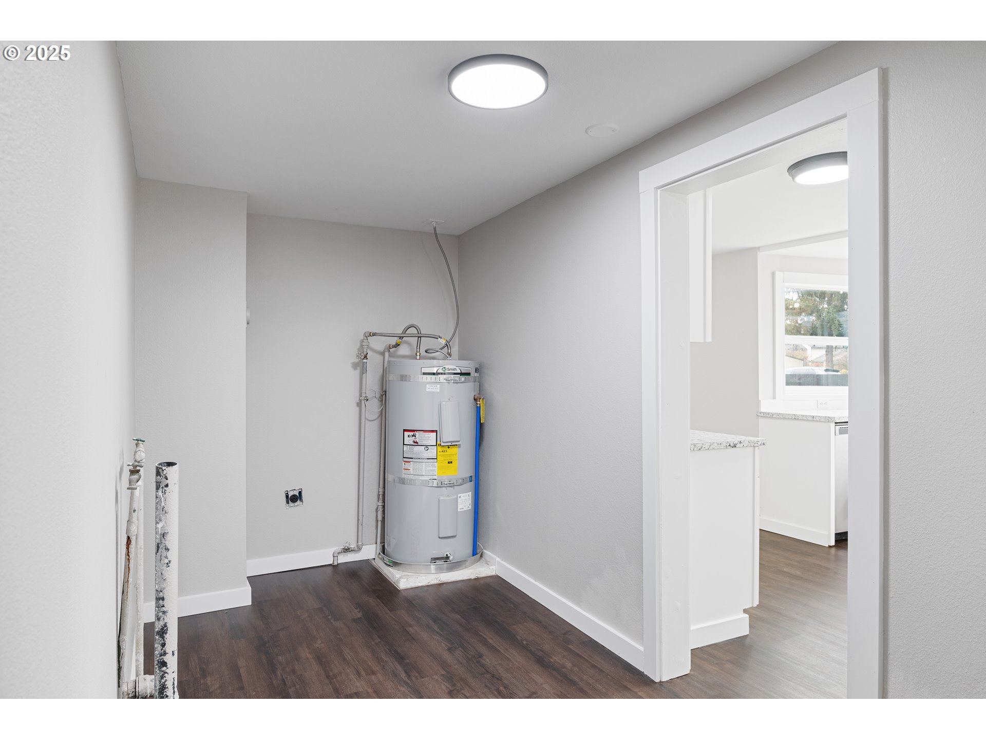 3317 Olive Way Longview, WA 98632 - Photo 17 of 29 a view of an empty room and a gallery