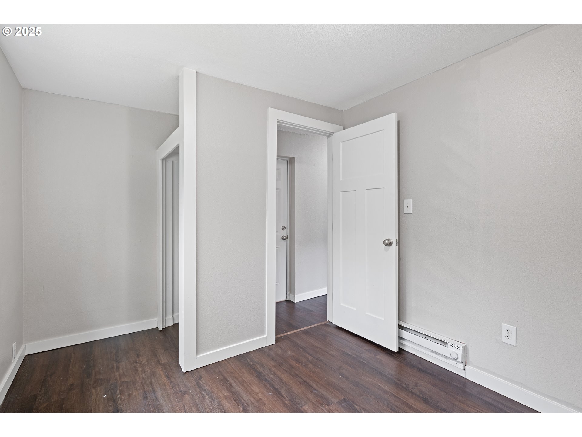 3317 Olive Way Longview, WA 98632 - Photo 21 of 29 a view of an empty room with wooden floor