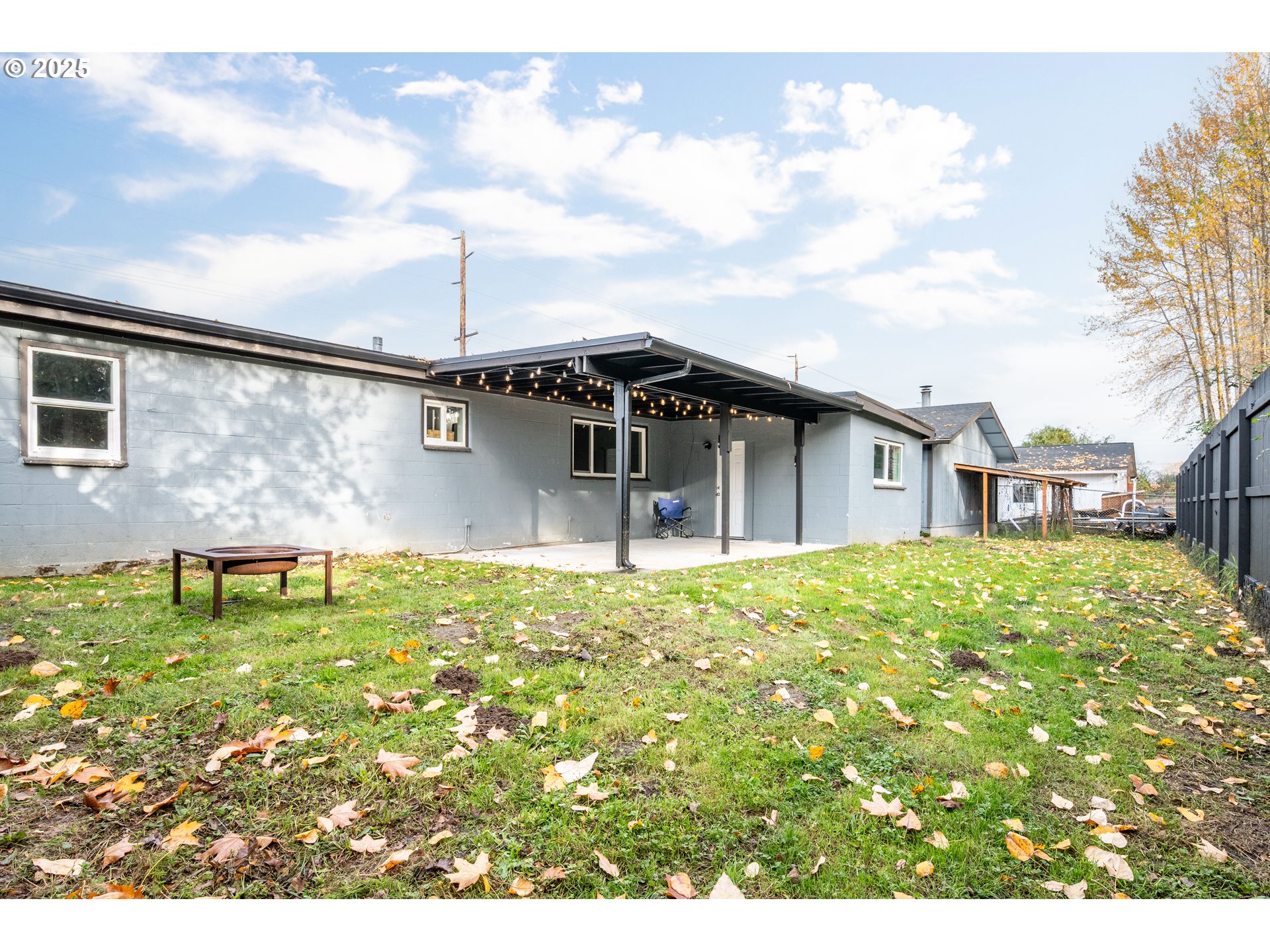 3317 Olive Way Longview, WA 98632 - Photo 24 of 29 a backyard of a house with table and chairs