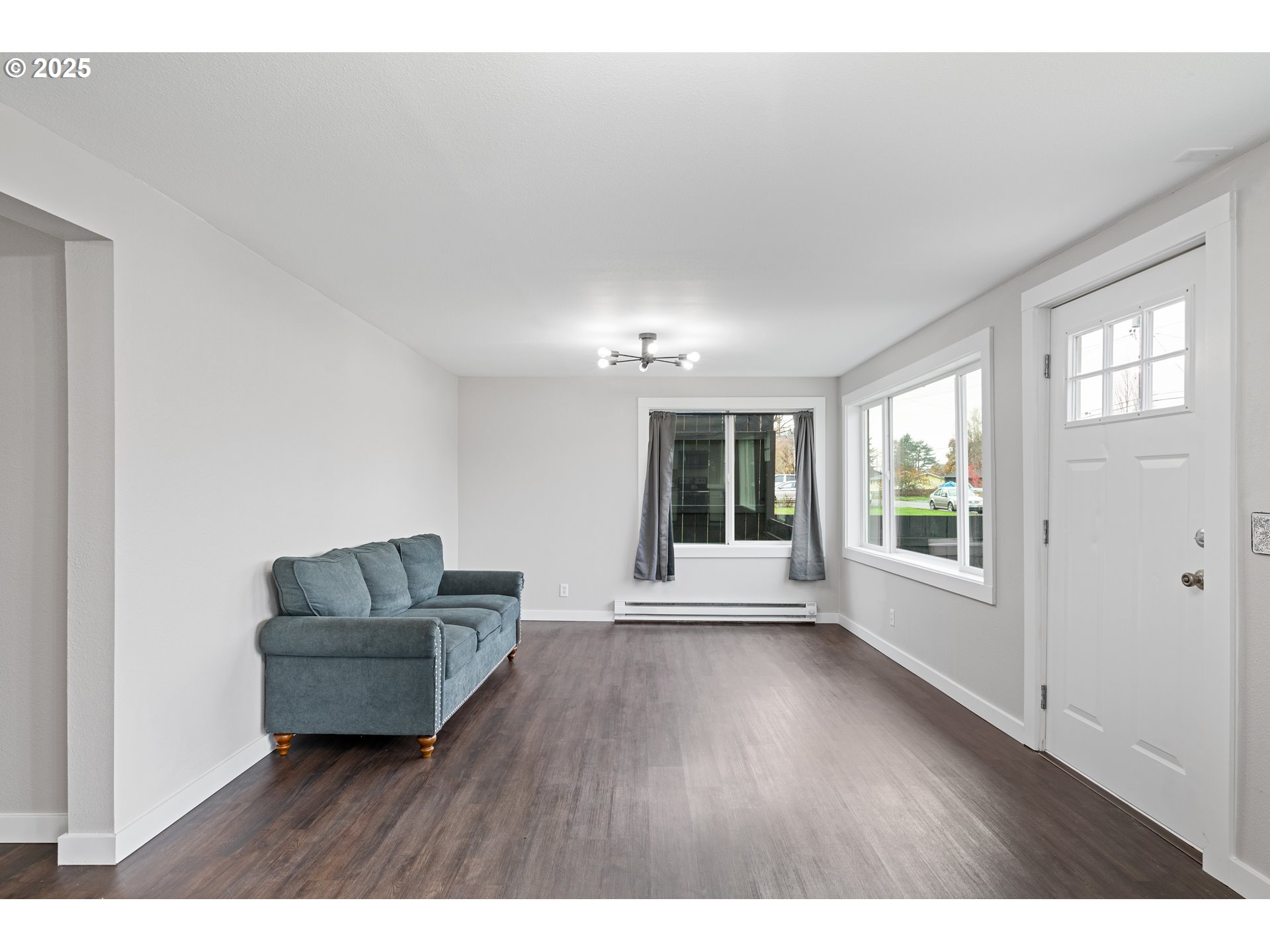 3317 Olive Way Longview, WA 98632 - Photo 5 of 29 a living room with furniture and a large window