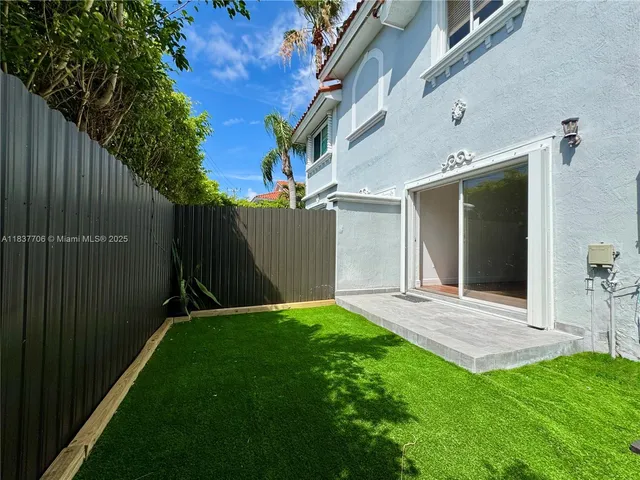 a view of a backyard with a garden