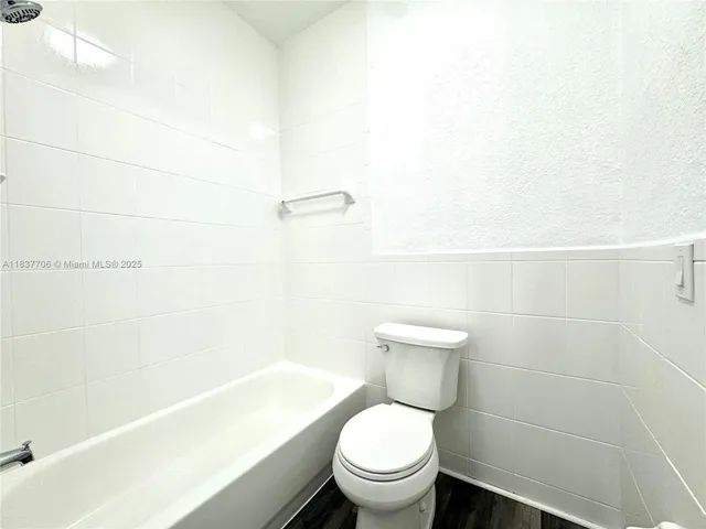 a view of a street with houses