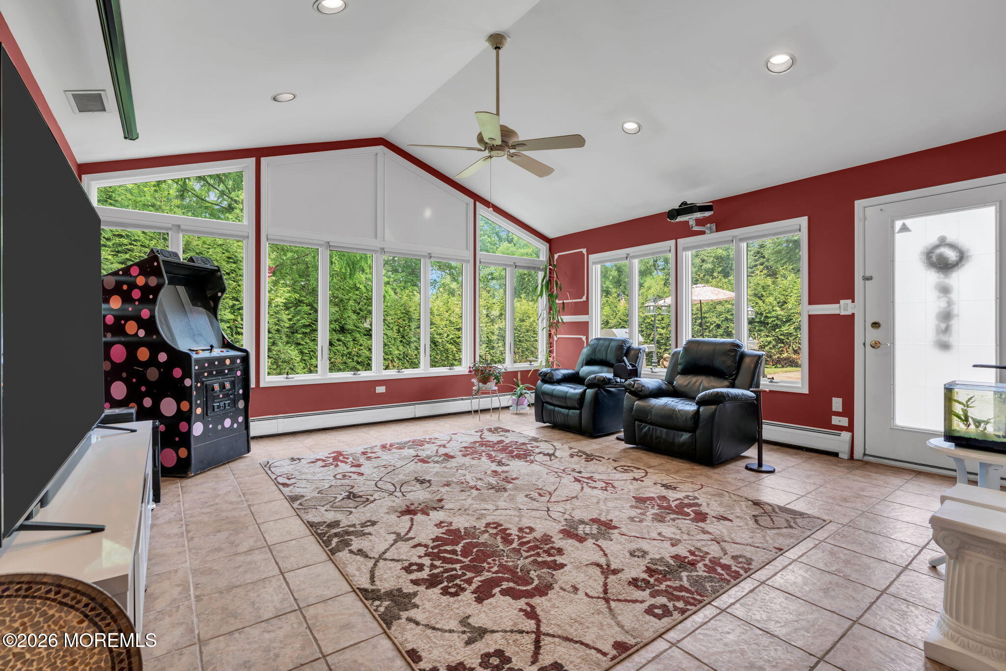 8 Owens Road Marlboro, NJ 07746 - Photo 7 of 39 a living room with furniture and large windows