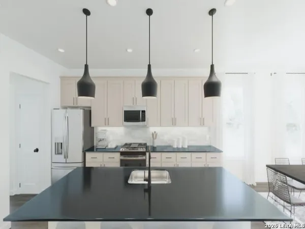 a view of a lake with a building in the background