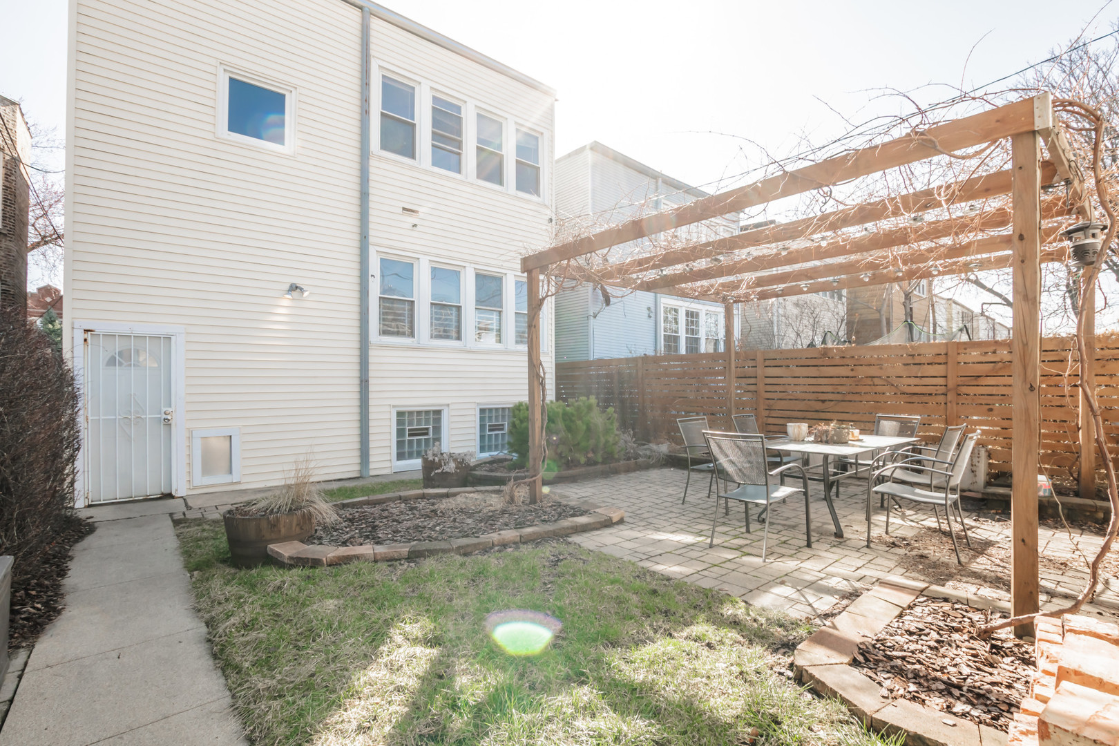 2136 North Avers Avenue, Unit 2 Chicago, IL 60647 - Photo 16 of 21 a view of a house with backyard and sitting area