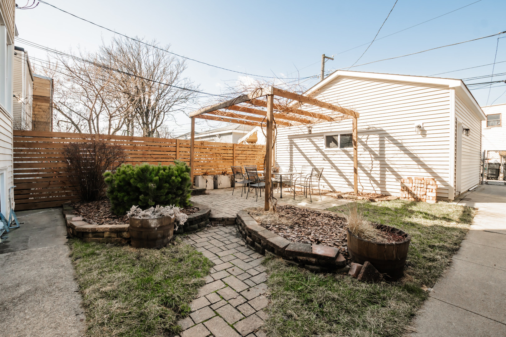 2136 North Avers Avenue, Unit 2 Chicago, IL 60647 - Photo 17 of 21 a view of a backyard with sitting area