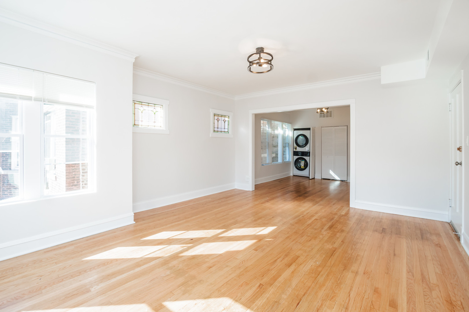 2136 North Avers Avenue, Unit 2 Chicago, IL 60647 - Photo 5 of 21 a view of empty room with wooden floor