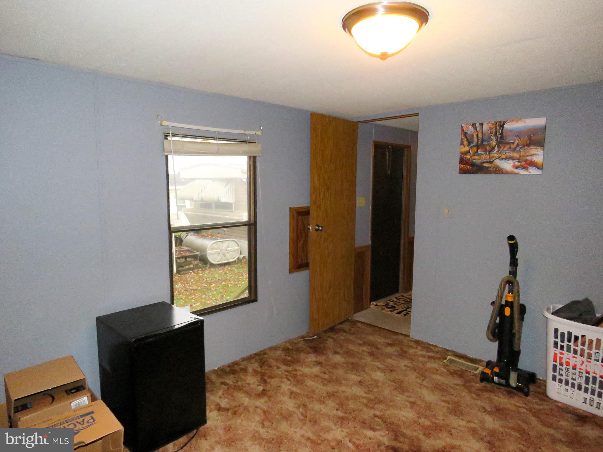 2379 River Road Bainbridge, PA 17502 - Photo 13 of 15 a bedroom with a bed and window