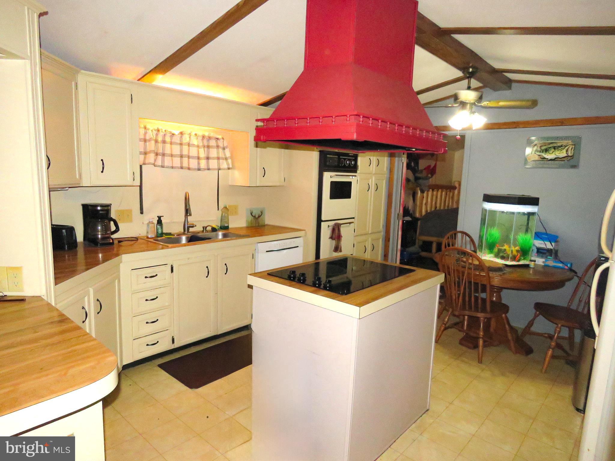 2379 River Road Bainbridge, PA 17502 - Photo 4 of 15 a kitchen that has a cabinets and a stove