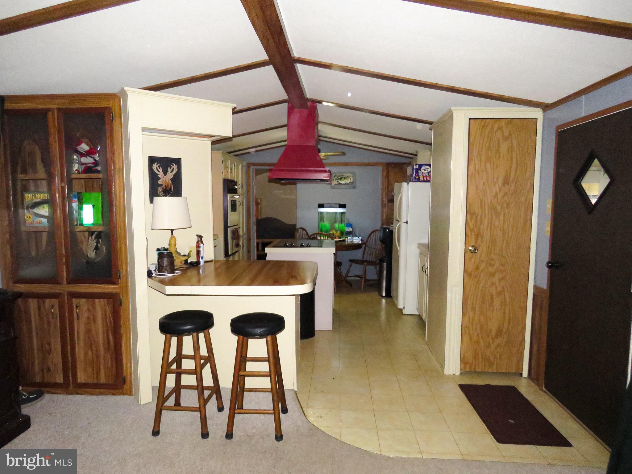 2379 River Road Bainbridge, PA 17502 - Photo 5 of 15 a living room with furniture a dining table and chairs