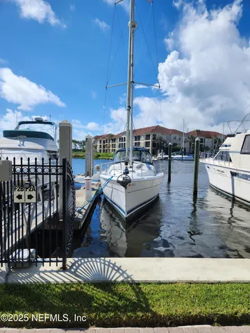 a view of a swimming pool with sitting area