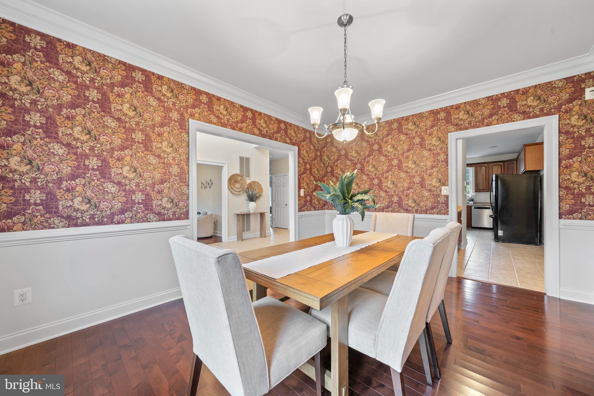 3300 Lancer Court Dunkirk, MD 20754 - Photo 11 of 89 a view of a dining room with furniture window and wooden floor