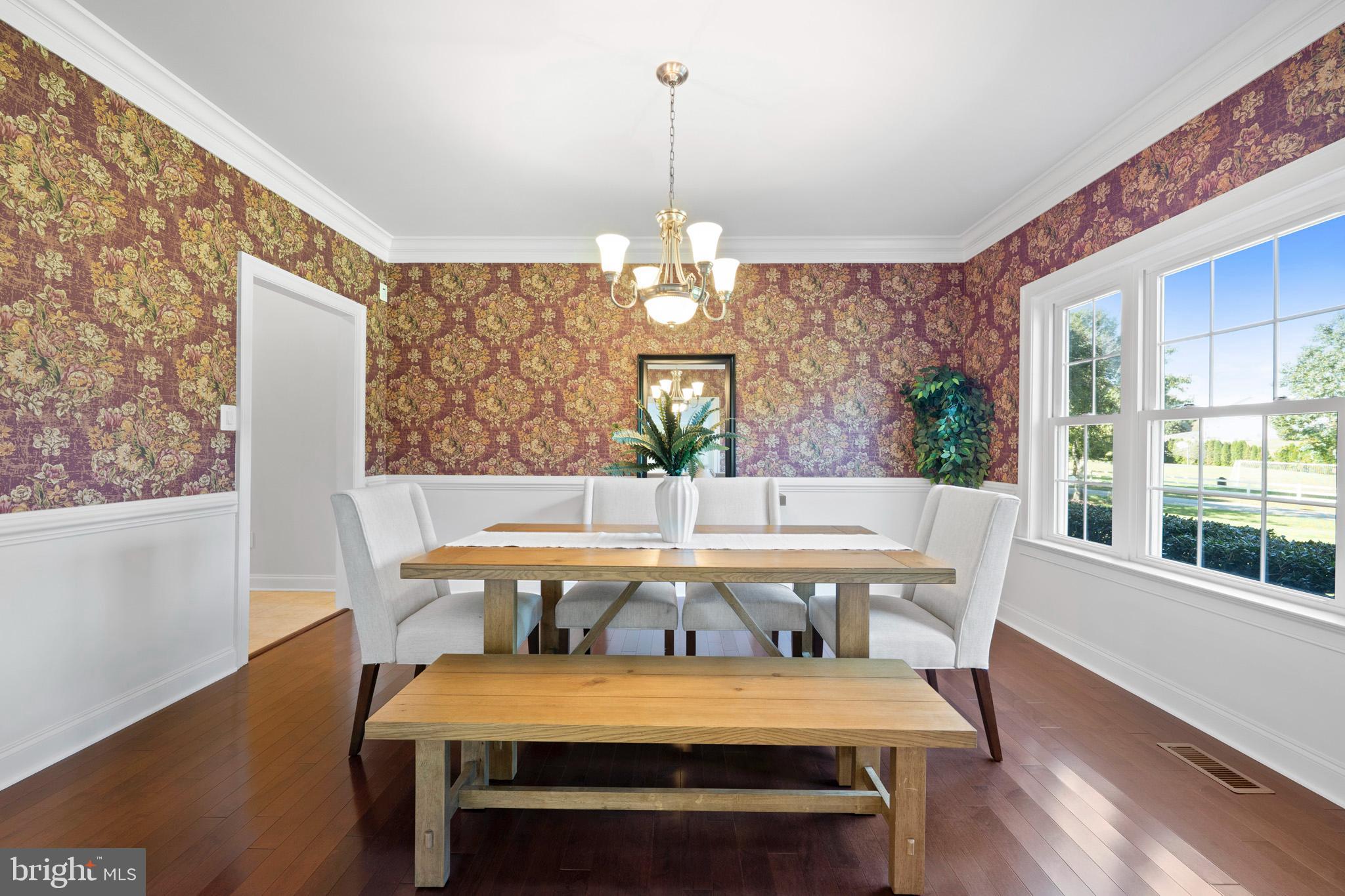 3300 Lancer Court Dunkirk, MD 20754 - Photo 13 of 89 a view of a dining room with furniture window and wooden floor