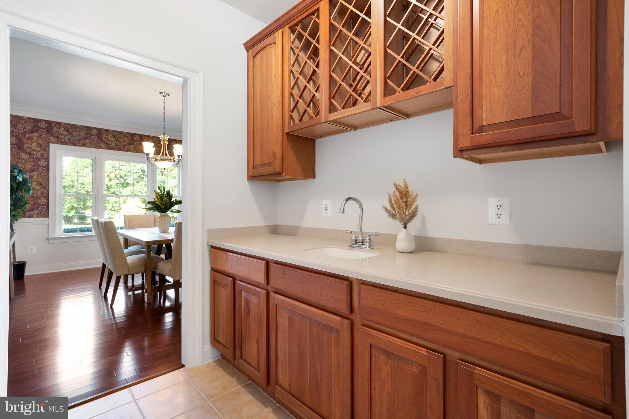 3300 Lancer Court Dunkirk, MD 20754 - Photo 14 of 89 a kitchen with a sink cabinets and window