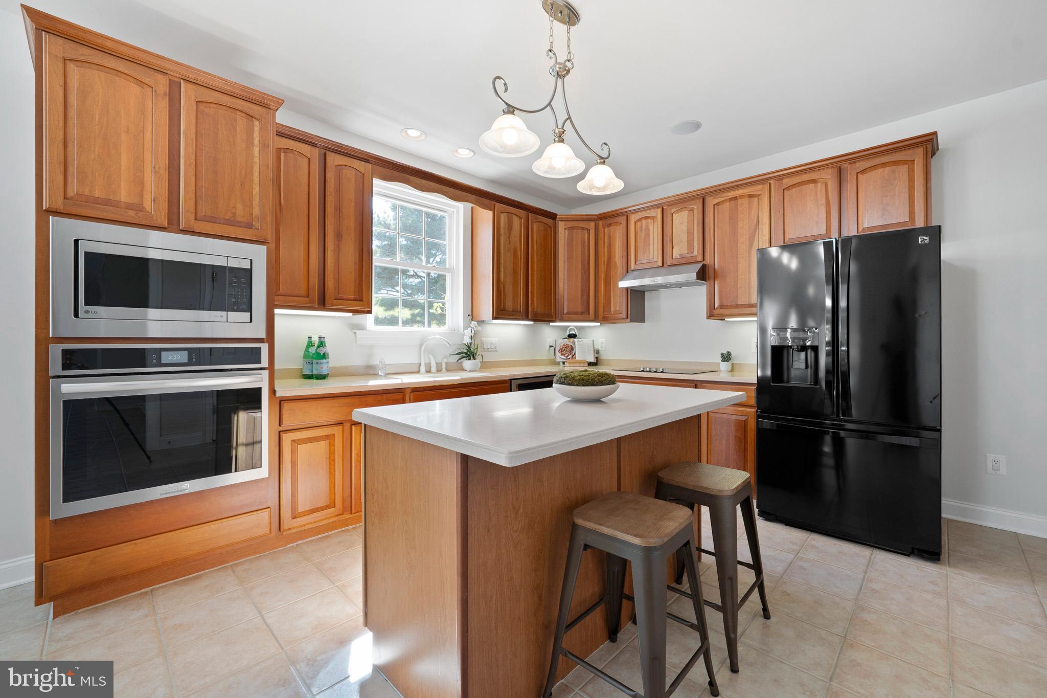 3300 Lancer Court Dunkirk, MD 20754 - Photo 17 of 89 Kitchen island with additional seating