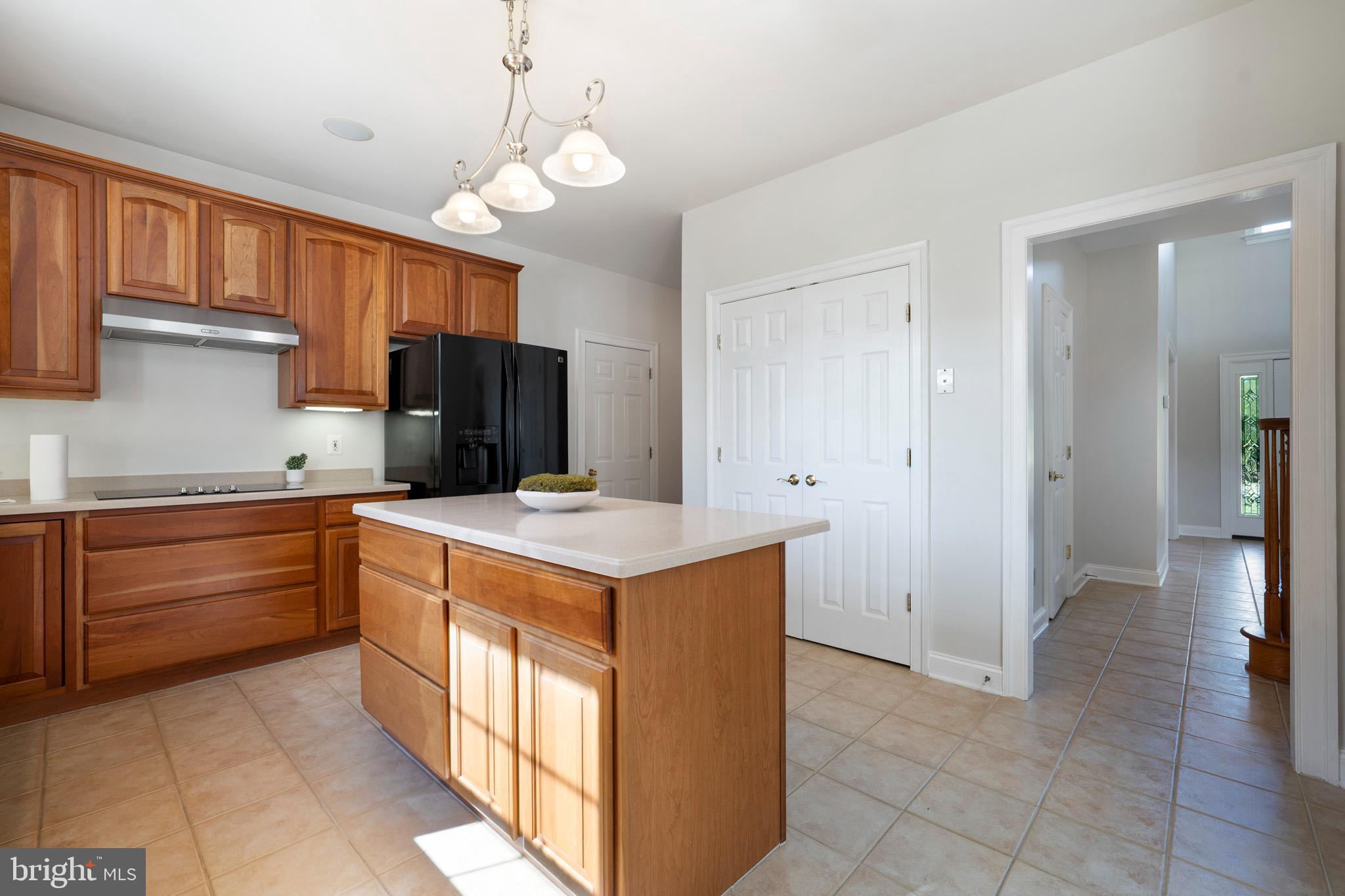 3300 Lancer Court Dunkirk, MD 20754 - Photo 18 of 89 Kitchen island with overhead pendant lighting