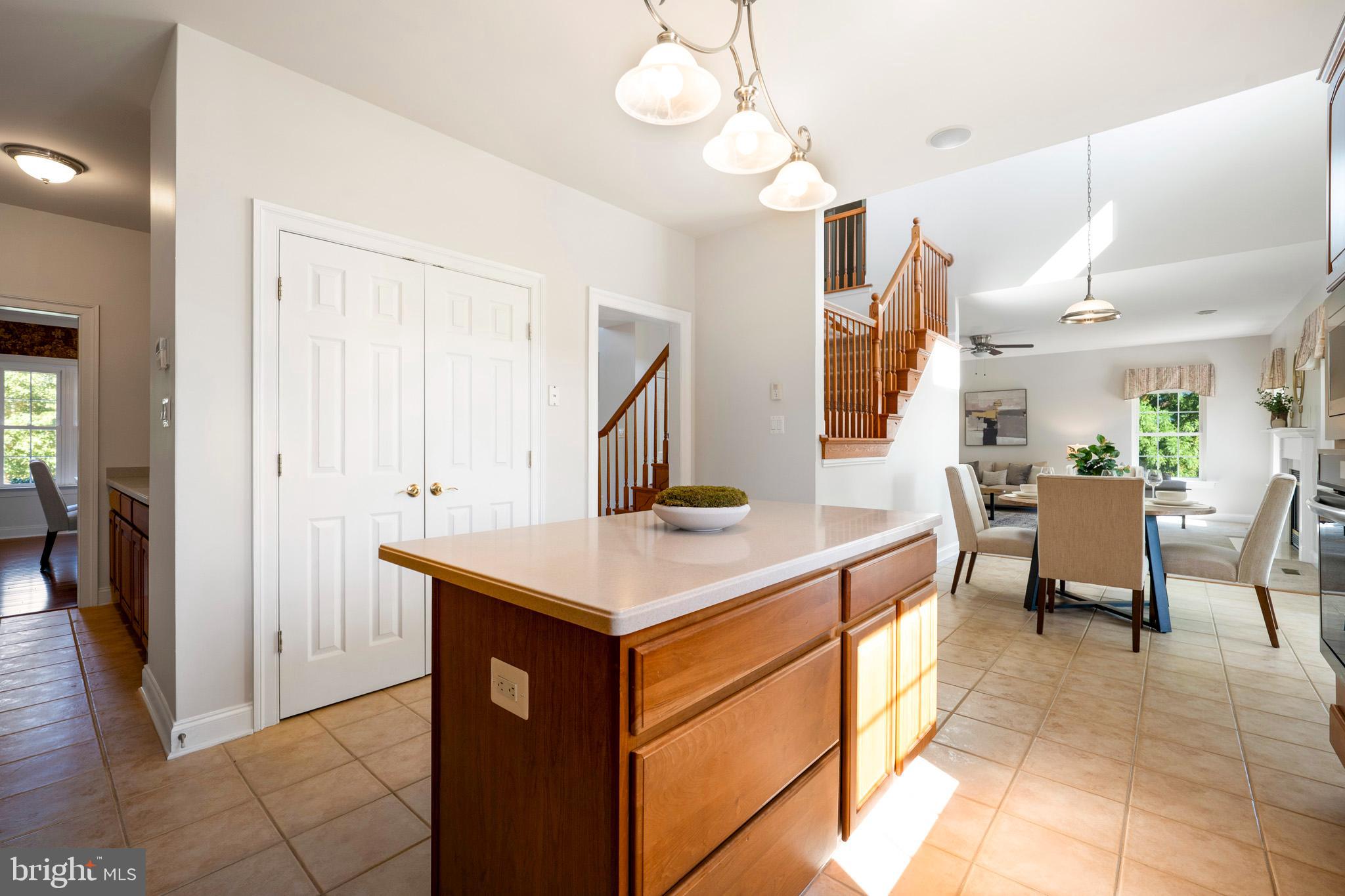 3300 Lancer Court Dunkirk, MD 20754 - Photo 21 of 89 a view of kitchen island with furniture and wooden floor