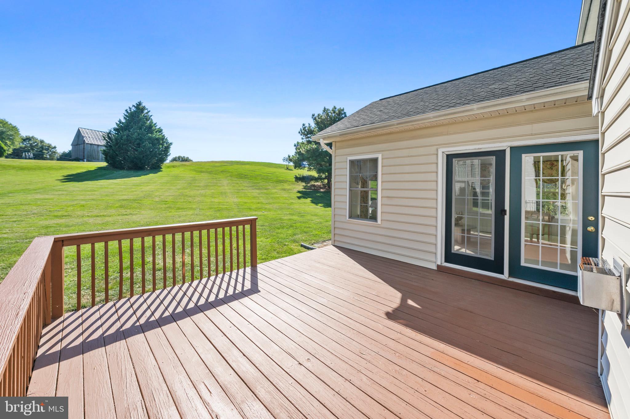 3300 Lancer Court Dunkirk, MD 20754 - Photo 28 of 89 a view of a wooden deck with a yard