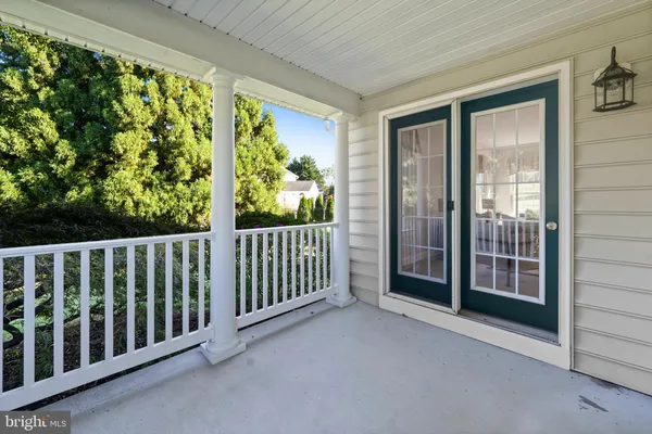 a view of an empty room and entryway