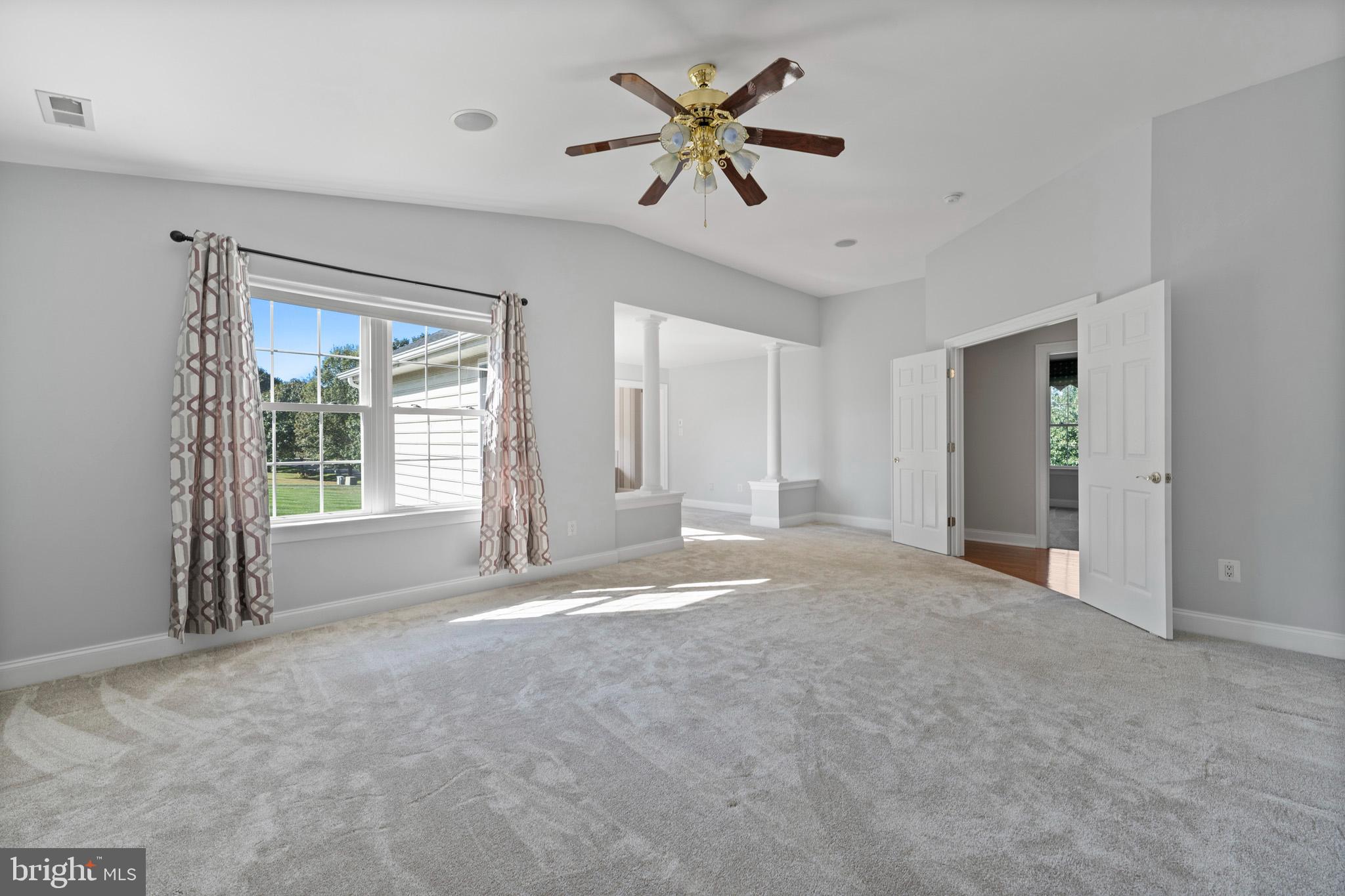 3300 Lancer Court Dunkirk, MD 20754 - Photo 43 of 89 a view of a livingroom with a ceiling fan and window