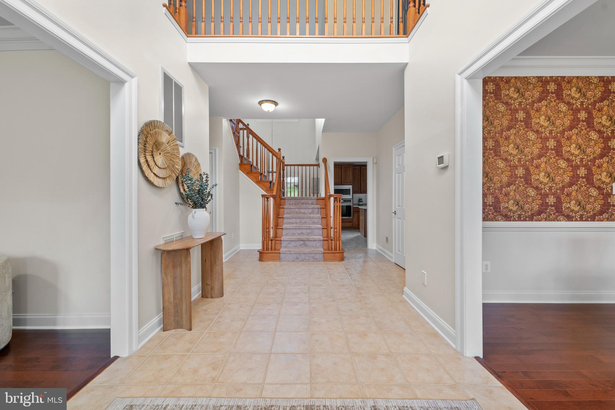 3300 Lancer Court Dunkirk, MD 20754 - Photo 5 of 89 a view of room with furniture and wooden floor