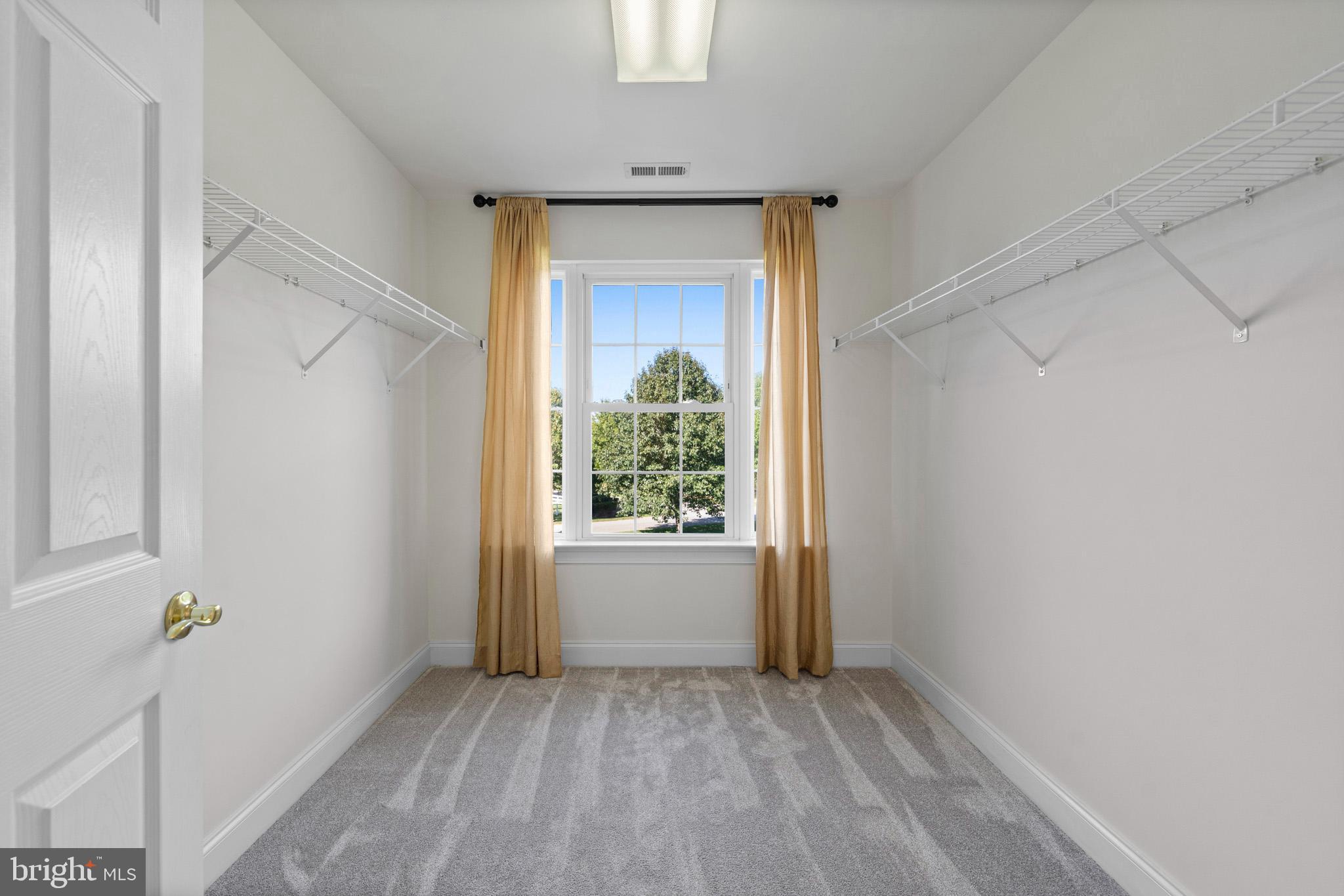 3300 Lancer Court Dunkirk, MD 20754 - Photo 52 of 89 a view of a hallway with wooden floor and a window
