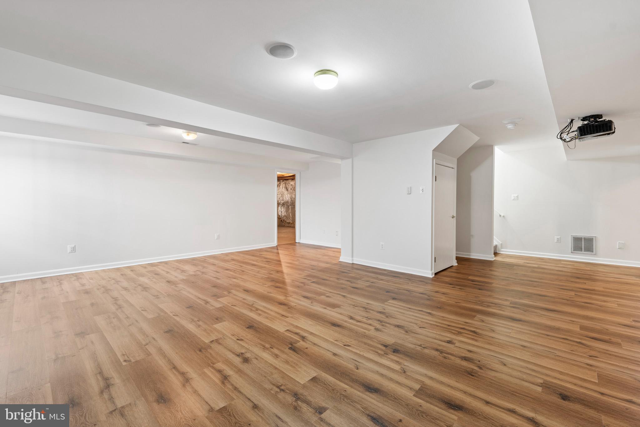 3300 Lancer Court Dunkirk, MD 20754 - Photo 60 of 89 a view of empty room with wooden floor